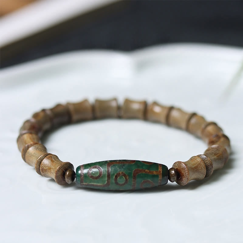 Buddha Stones Tibetan Nine-eye Dzi Bead Green Sandalwood Peace Bracelet