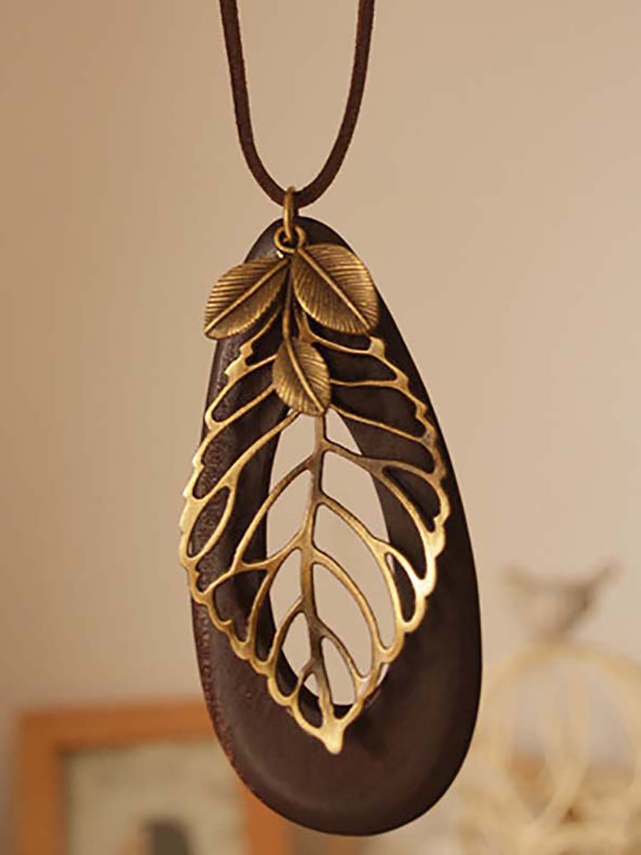Artsy Hollow Out Metal Leaf Oval Wool Necklace At1058