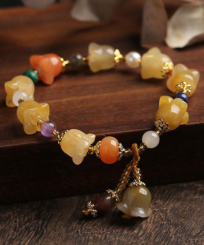 Golden Silk Jade Lily of the Rings Charm Bracelet