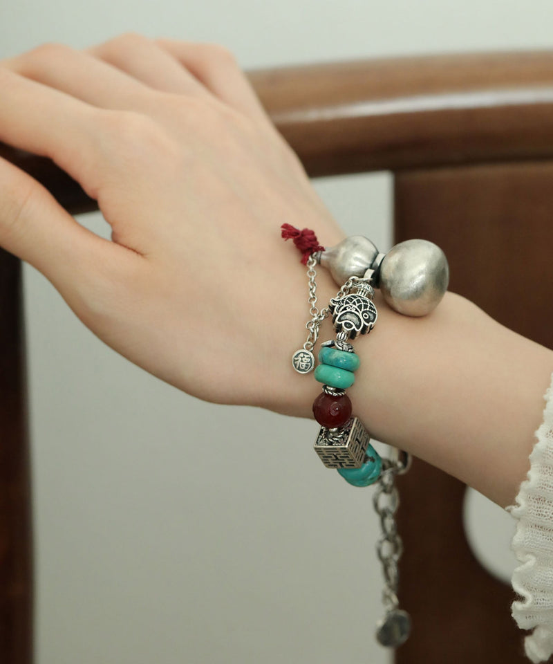 Silk Sterling Silver Calabash Turquoise Charm Bracelet