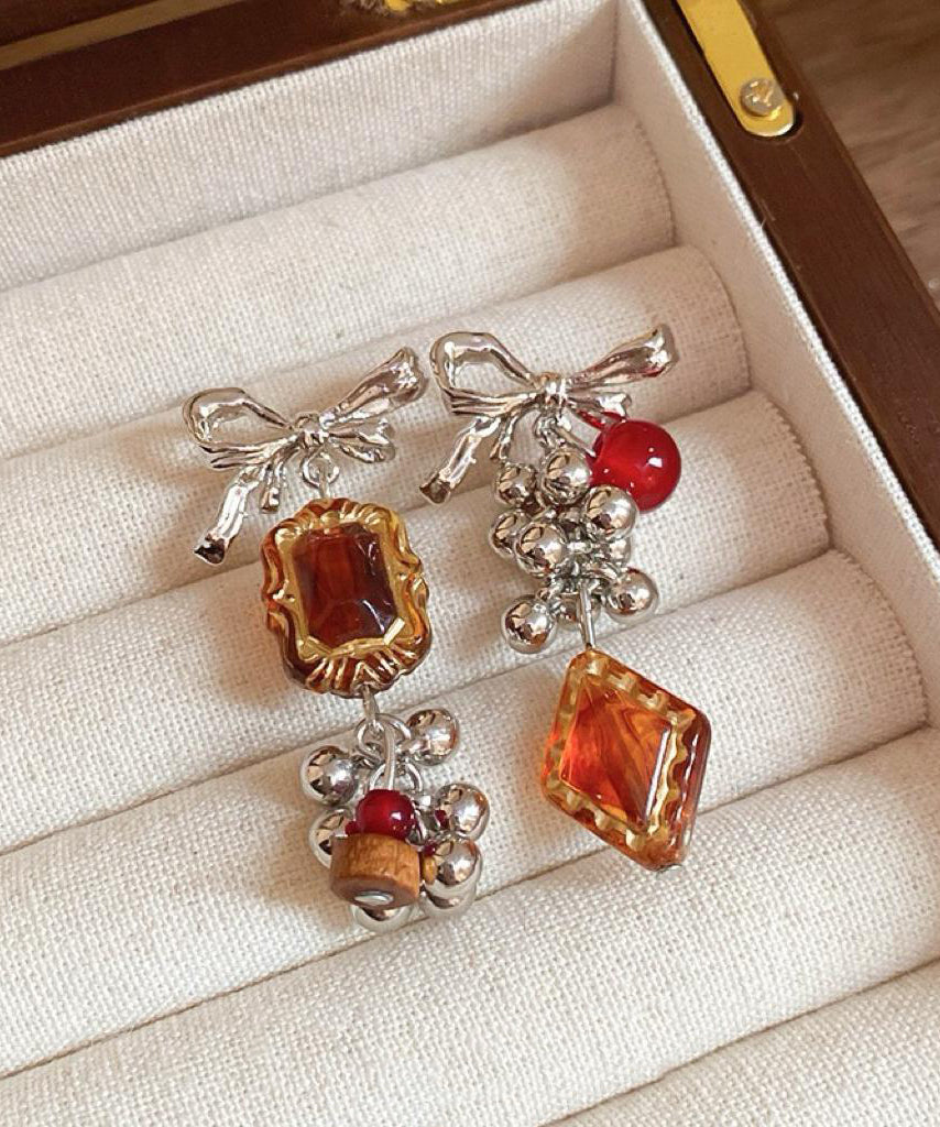 Acrylic Alloy Asymmetrical Amber Bow Tassel Drop Earrings