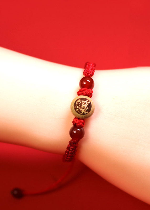 Red Hand Knitting Peach Wood Charm Bracelet