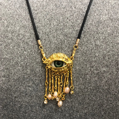 Statement Gold Eye Tassel Necklace