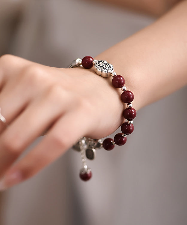 Mulberry Sterling Silver Cinnabar Tassel Charm Bracelet Kx1048