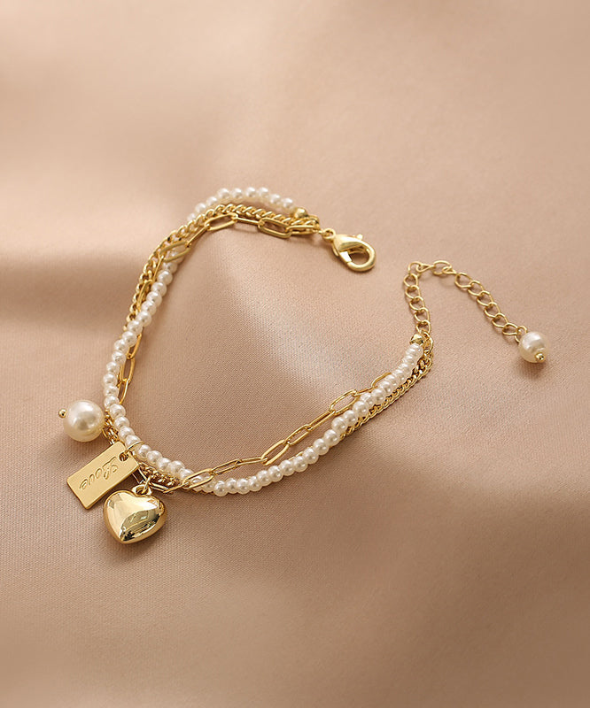 Vogue Gold Metal Alloy Pearl Graphic Love Tassel Charm Braceletfine Silk Sterling Silver Broken Silver Gypsophila Necklace Et008