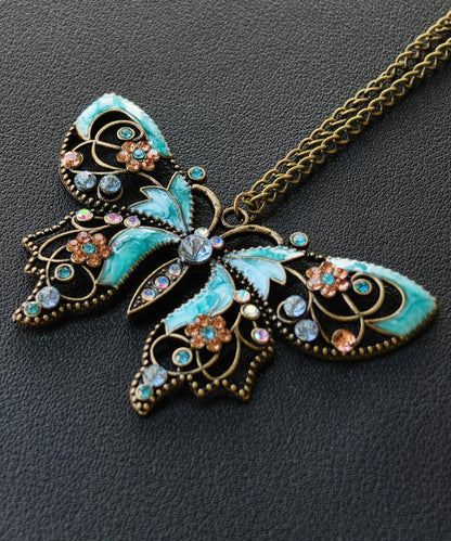Retro Blue Alloy Zircon Butterfly Hollow Out Pendant Necklace
