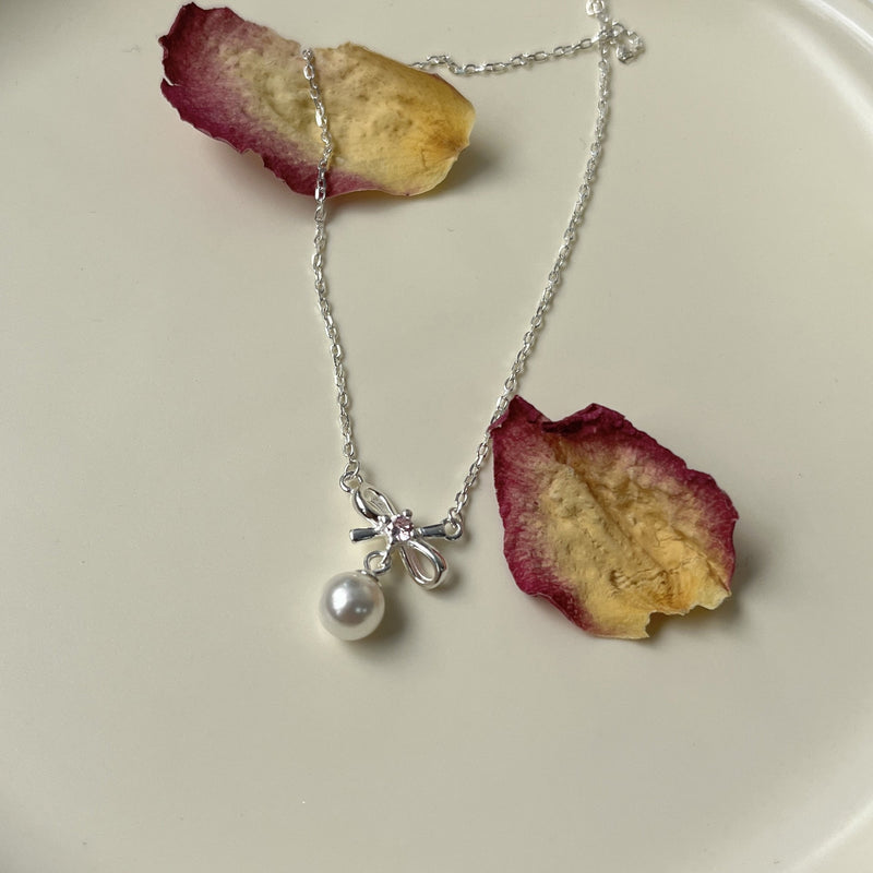 Cady Bow and Pearl Necklace