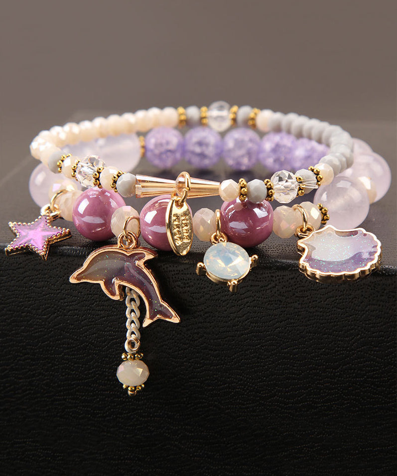 Purple Coloured Glaze Crystal Dolphin Star Charm Bracelet