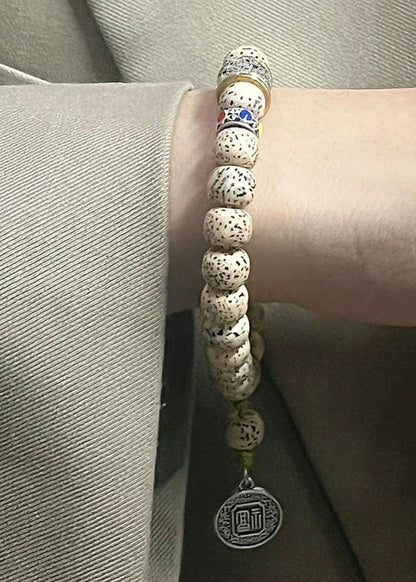 Pipal Tree Seed Fu Character Charm Bracelet