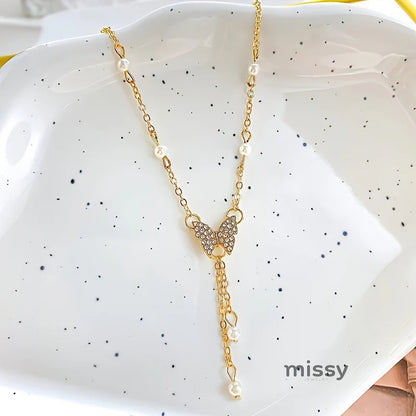 Meklit Pearl Butterfly Choker Necklace