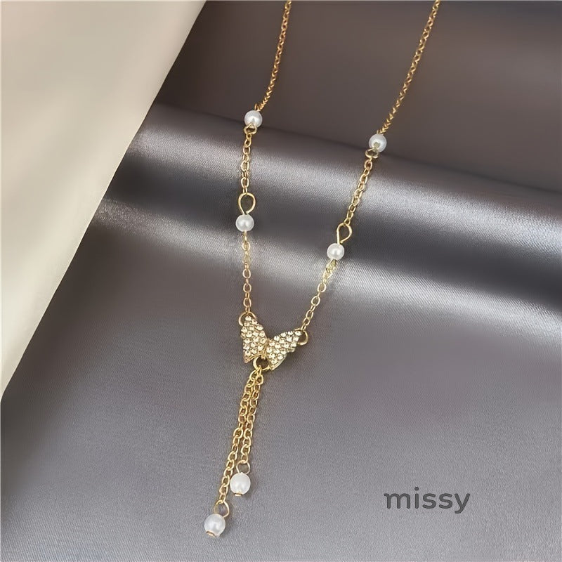 Meklit Pearl Butterfly Choker Necklace