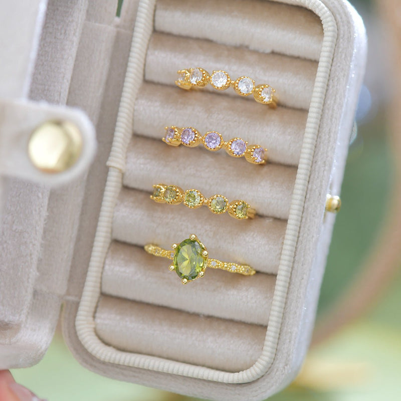 Oval Peridot Ring in Gold